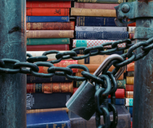 Books locked behind gate