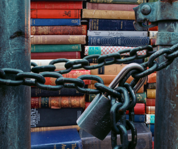 Books locked behind gate