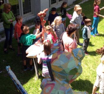 Group event in the side garden at the Norman Williams Public Library