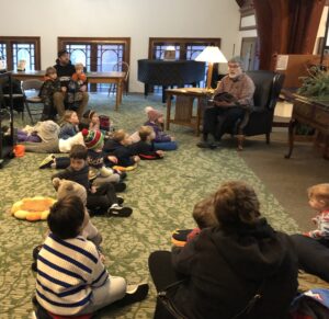 Marv Klassen Landis reading to children on the Mezzanine