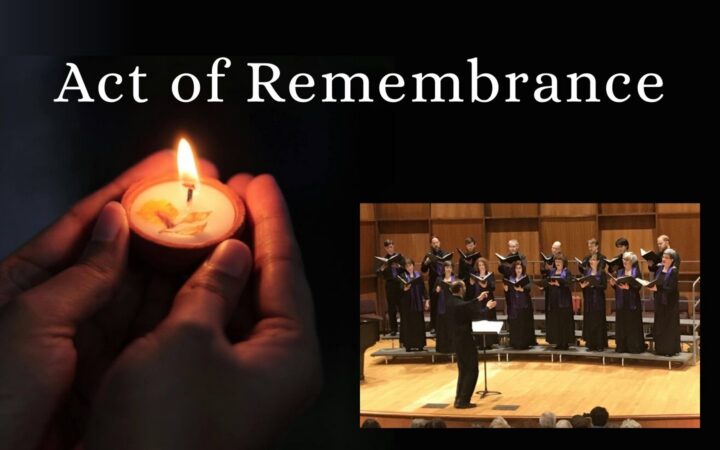 hand holding a candle & singers