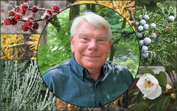 Warren Leach with photos of plants from the cover of his book