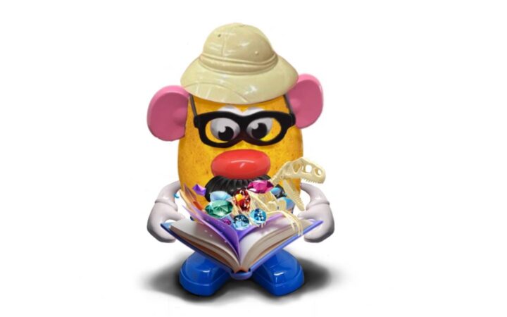 Potato Head reading a book