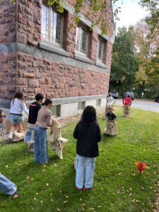 Children's sack races on the library lawn
