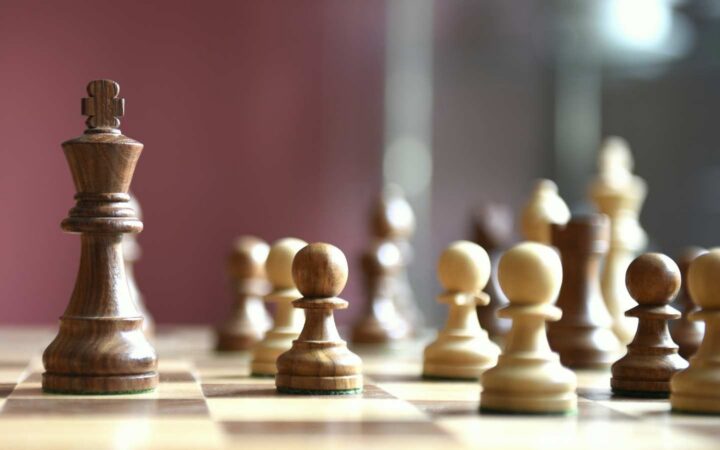 chess pieces against a red background